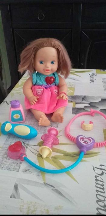 Poupée + accessoire