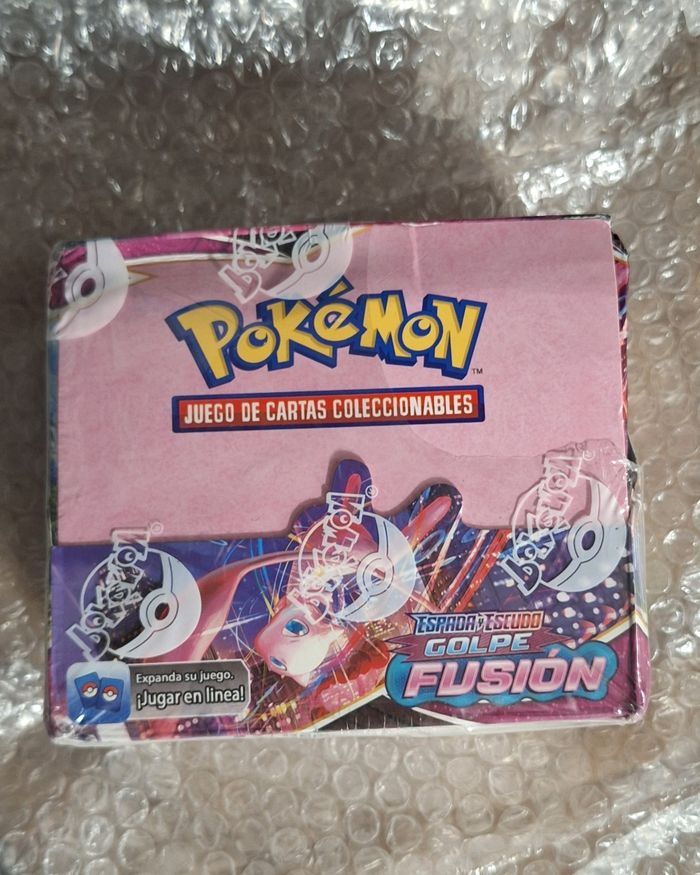 Pack carte pokemon 36 booster, poing de fusion. (Carte en espagnol )