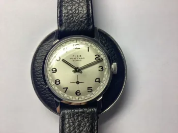 Montre mécanique Flex. Etat exceptionnel! Révisée et garantie!