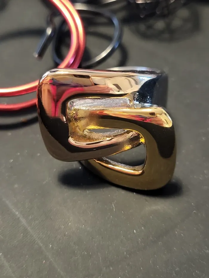 Bague acier inoxydable dorée et argent boucle infinie taille 8 - photo numéro 2