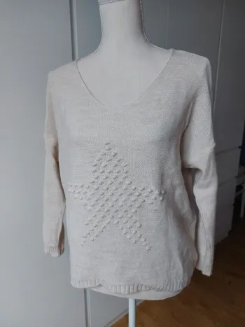 Pull col V détail devant
