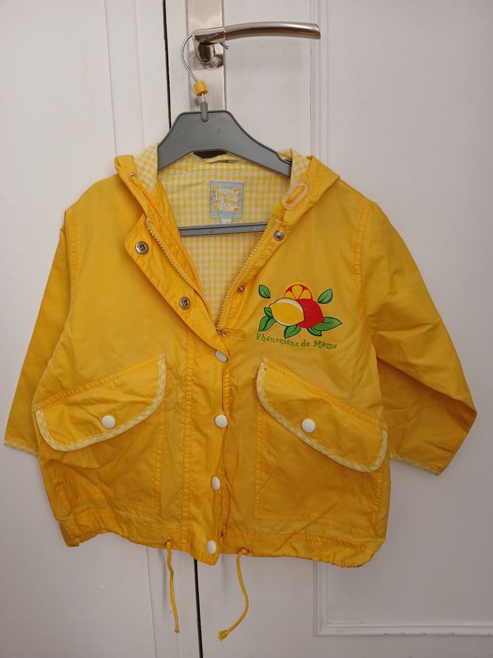 Kway avec capuche et poches fermées