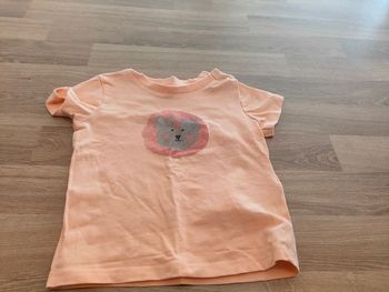 T-shirt orange avec lion devant