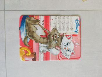 lot de 2 puzzles "Les aristochats" et animaux de la savane