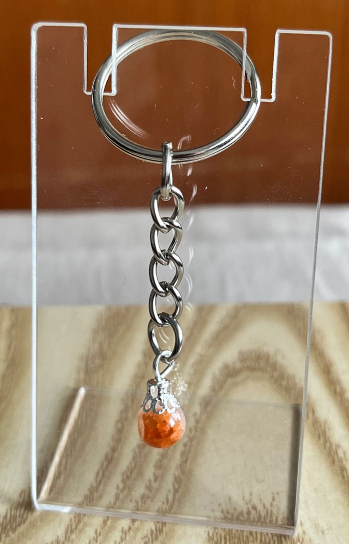 Porte clé perle orange