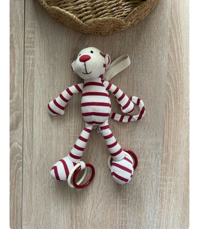 Peluche singe rayé rouge jellycat