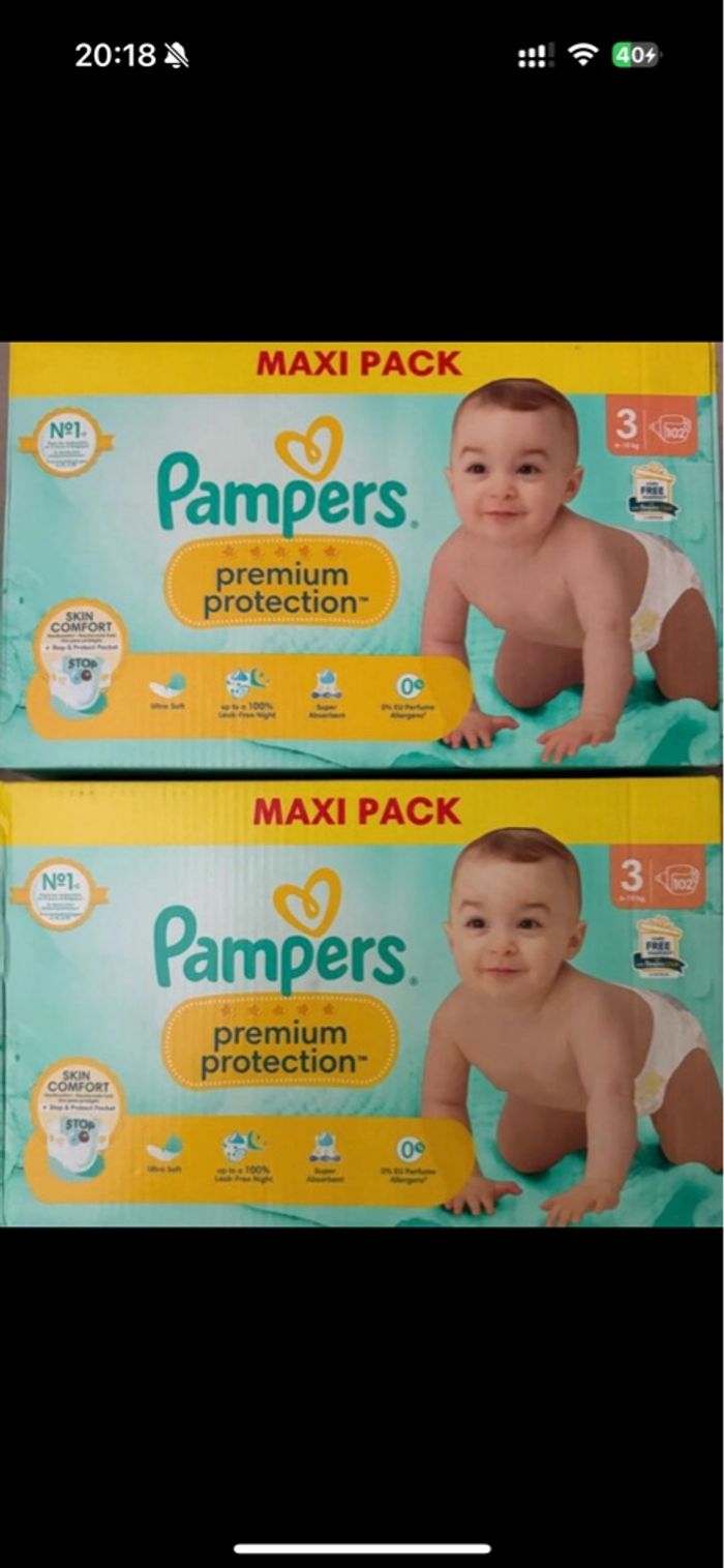 2 cartons de couches Pampers taille 3