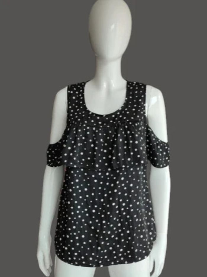 Blouse noire à pois blanc