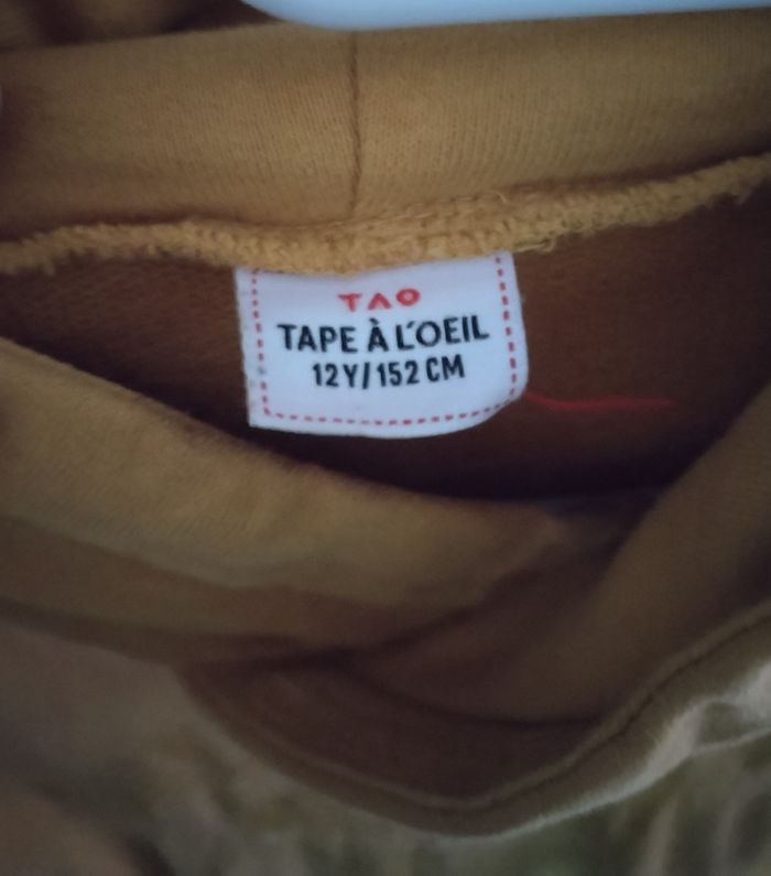 Sweat à capuche avec deux poches "Tape à l'œil" en très bon état - photo numéro 2