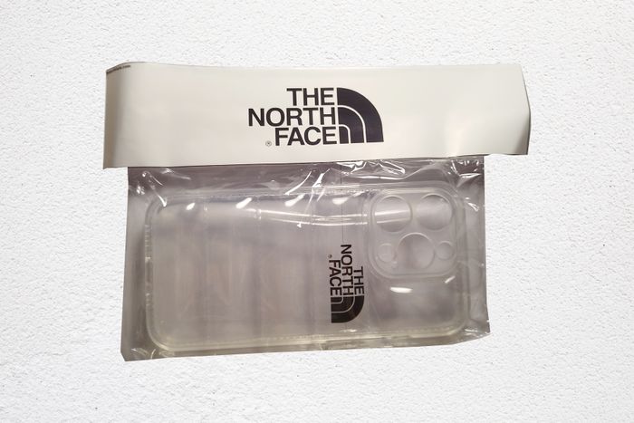The North Face - Puffer Jacket - Coque Clear White pour Apple Iphone 15 Pro - Neuve