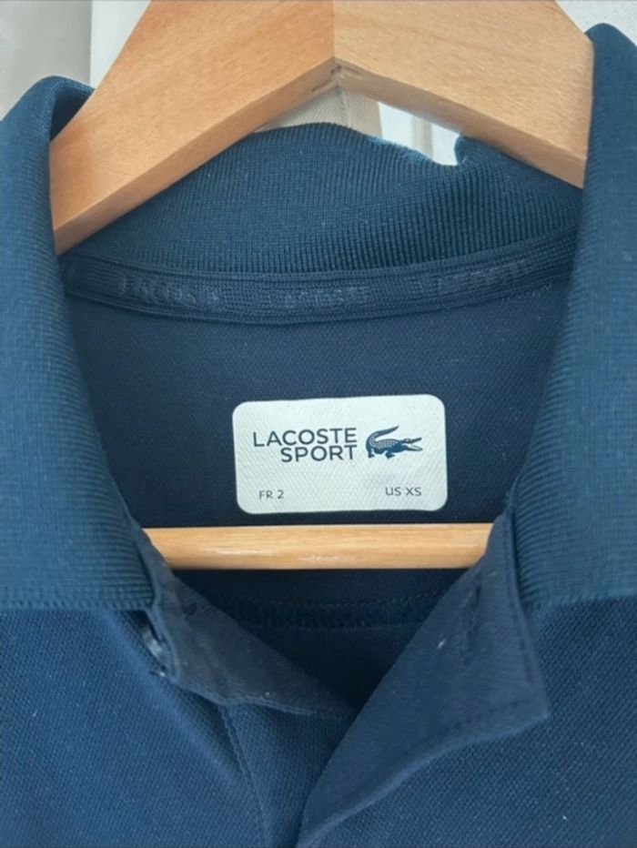 Polo Lacoste 🐊 Taille XS 📏 - photo numéro 2