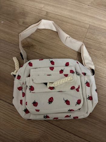 Sac velours fraise