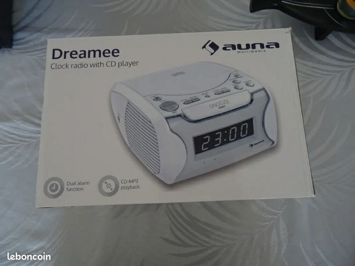 Radio-réveil avec lecteur CD et port USB
Couleur blanc