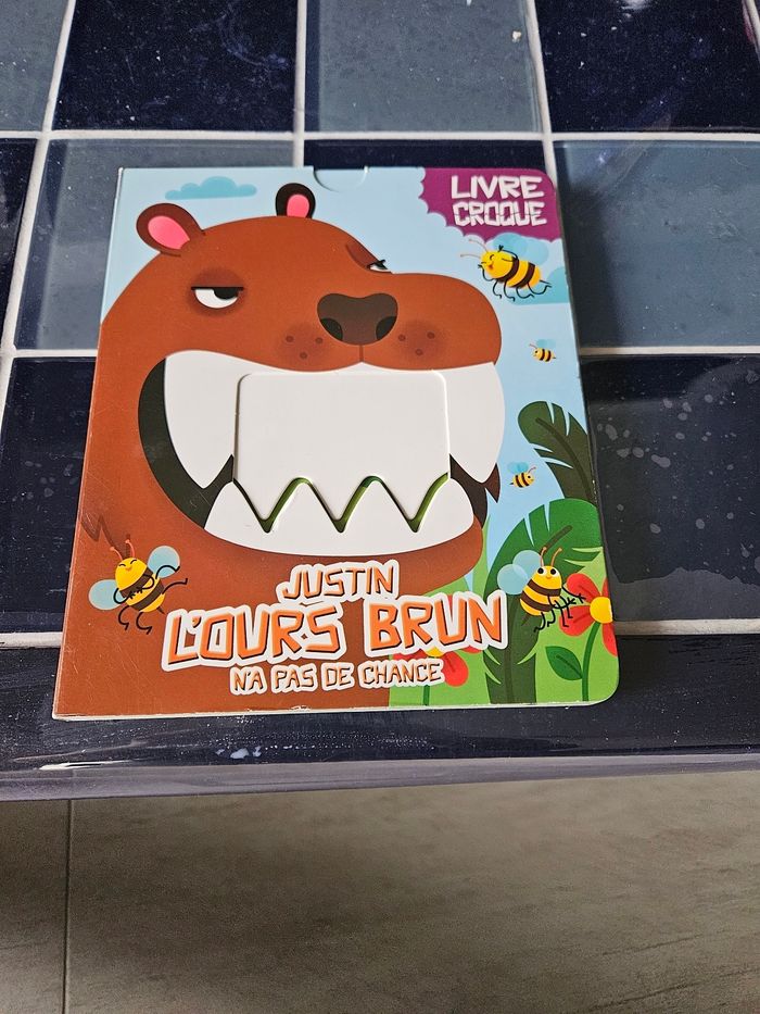 Justin l'ours brun a pas de chance