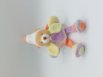 DOUDOU ET COMPAGNIE peluche ours bonnet pétales orange vert jaune GRELOT HS