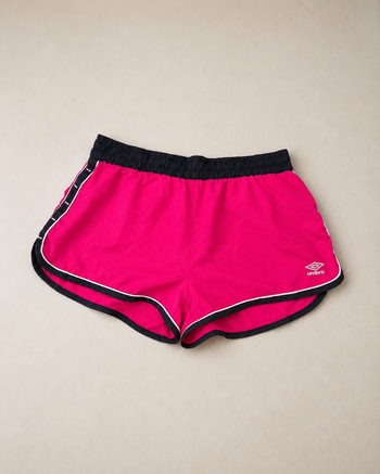 Short sport Umbro rose femme T.M