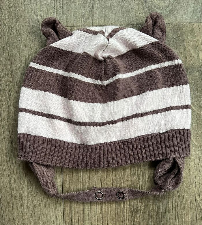 Bonnet avec cache oreilles et attache pression 47cm Orchestra