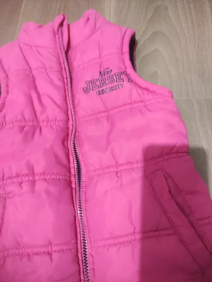 Doudoune manche courte rose en très bon état taille 8 ans - photo numéro 2