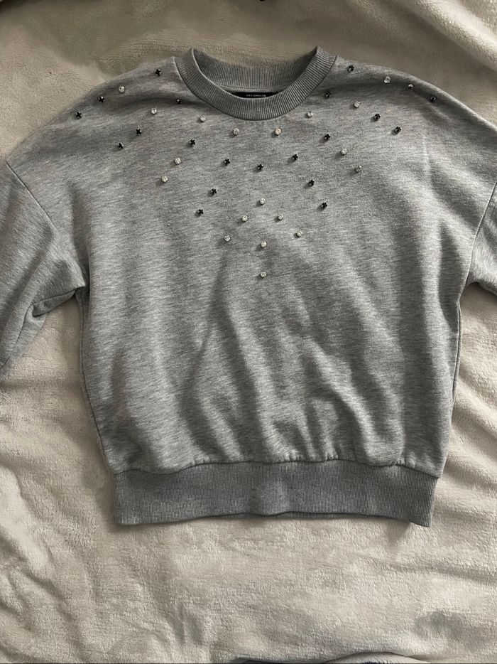 Pull gris à strass