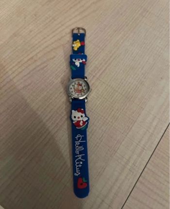 Montre fille hello kitty bleu pour apprendre à lire l'heure