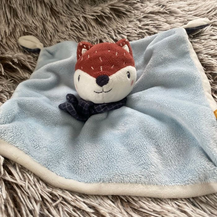 Doudou plat renard tape à l’œil
