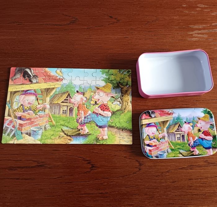 Puzzle de 60 pièces ,les 3 petits cochons ,boîtes en fer