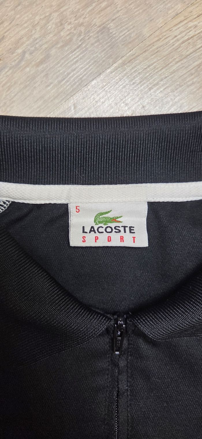 Polo Lacoste taille 5 / L noir et blanc Très bon état - photo numéro 4