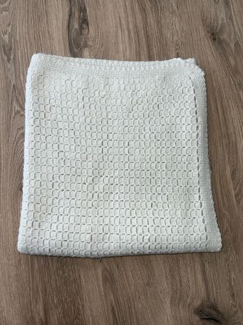 Couverture en tricot blanc