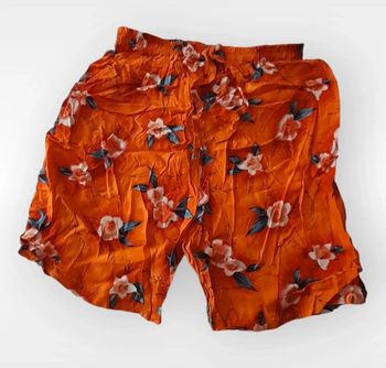 🎀 Short fluide orange à fleur
Taille XL
