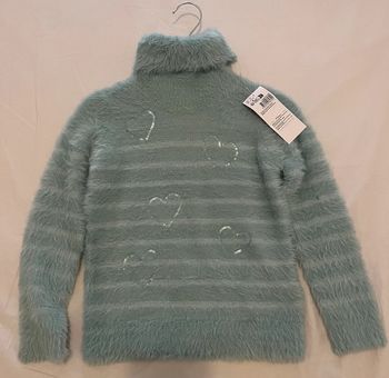 Pull col roulé,fille .6 ans