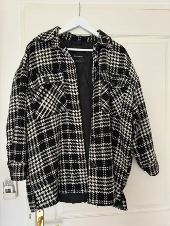 Veste longue carreaux oversize