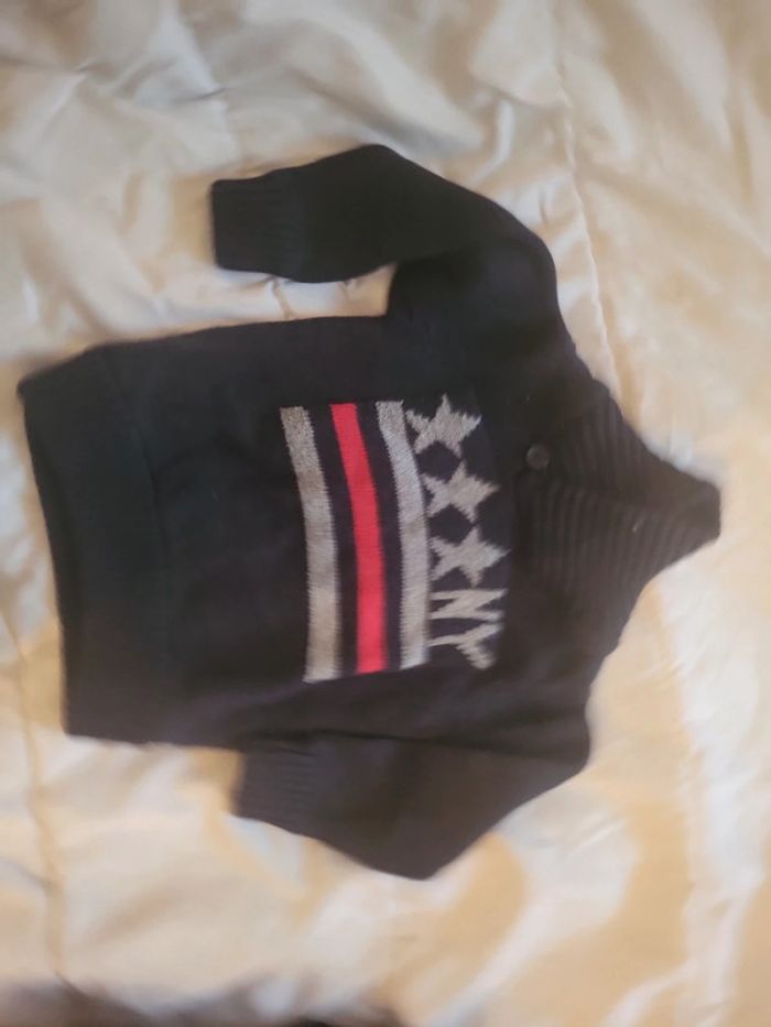 Pull tao 2 ans excellent etat mis 1 fois