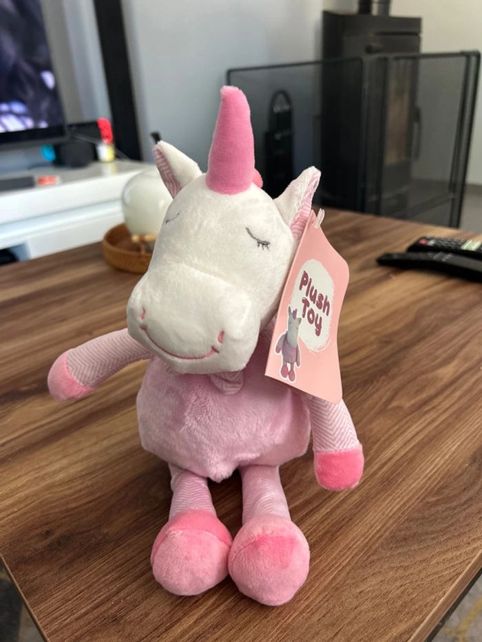 Peluche rose licorne