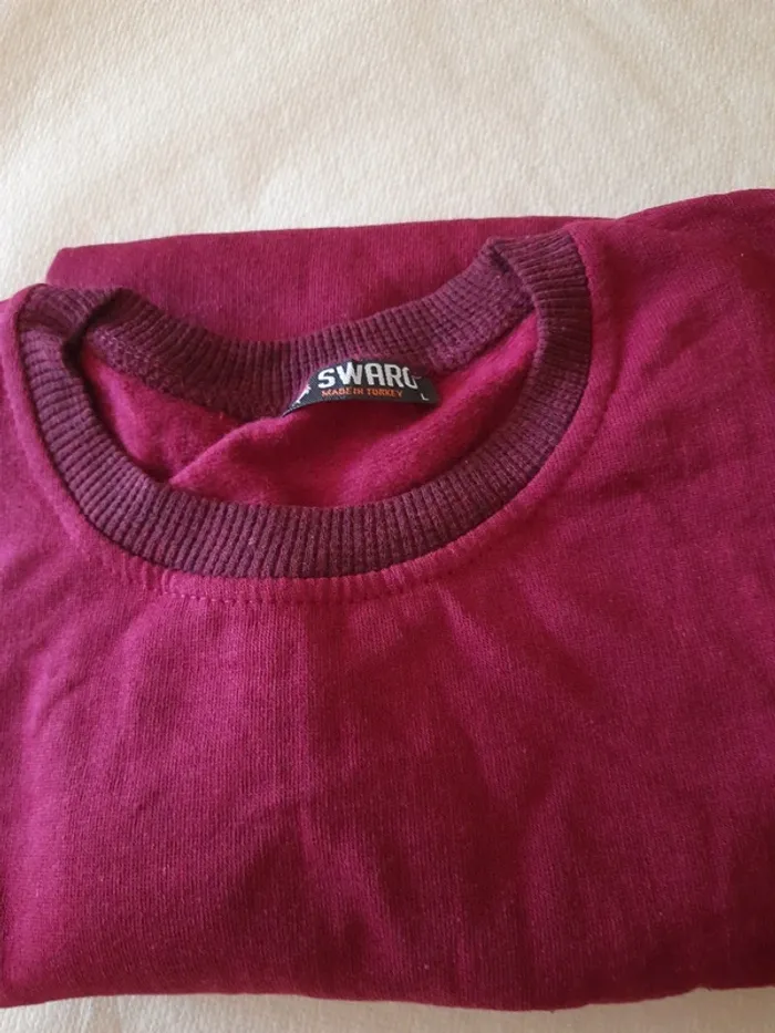 Pull léger taille L. Tbe