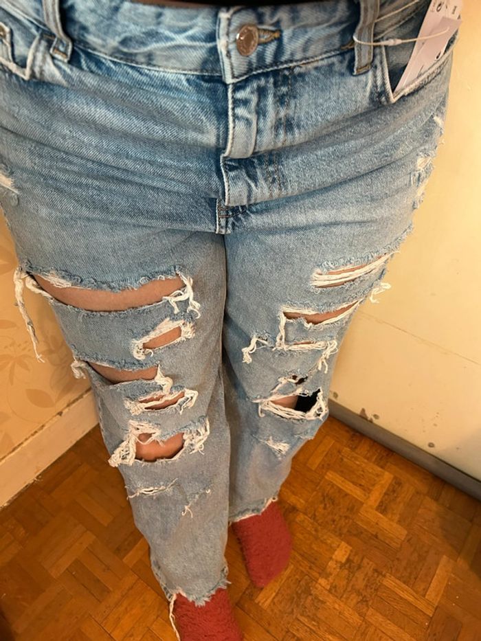 Jeans bleu clair effet déchiré • taille 42 - photo numéro 5