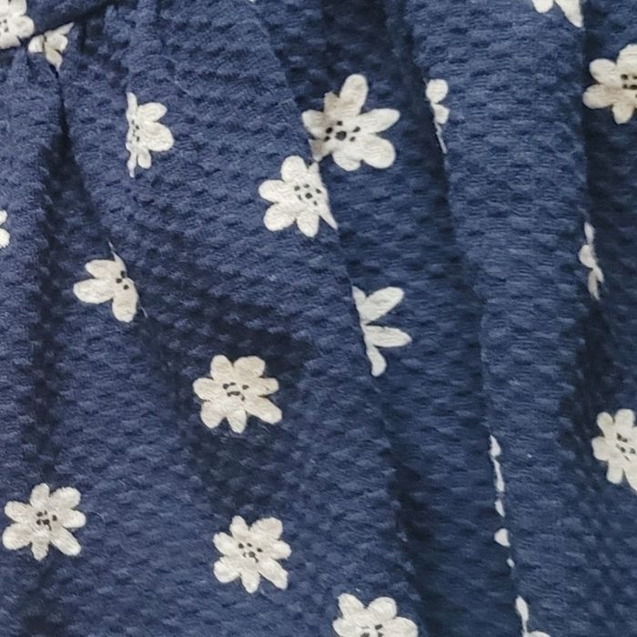 Très jolie robe bleu avec motif pâquerettes . Fille 8 ans. Marque Orchestra - photo numéro 2