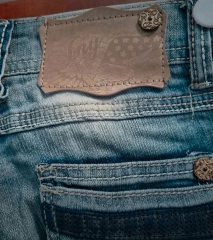 Jeans effet délavé avec troués taille 34 - photo numéro 8
