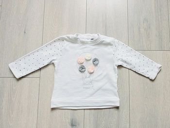 Pull fin blanc. Fille 12 mois. Marque Kiabi