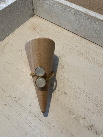 Bague dorée et blanche