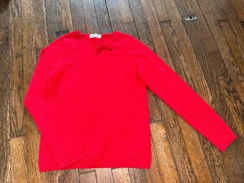 Pull H&M rouge brillant  10 ans