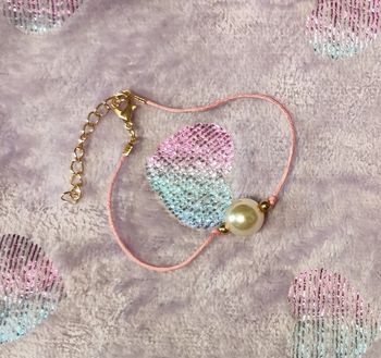 Bracelet rose avec perle blanche ajustable