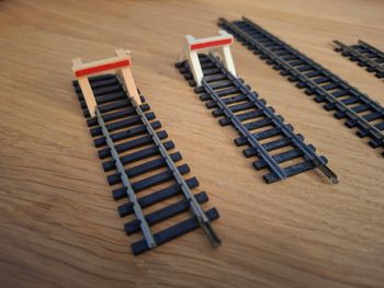 Lot de 13 rails droits + 2 butoirs Jouef (Échelle HO)
