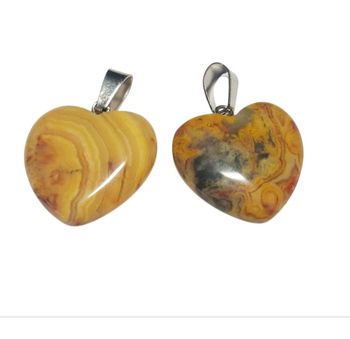 Deux pendentifs uniques en forme de cœur