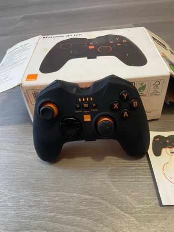 Manette de jeu Orange sans fil – Neuve (jamais utilisée) avec boîte