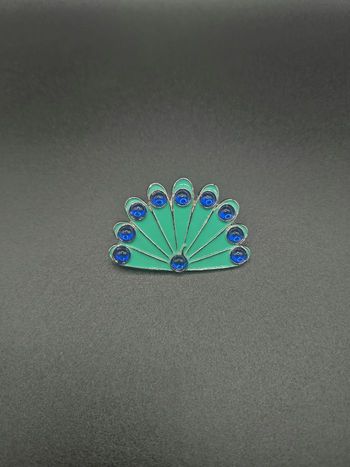 Bijou Miraculous du Paon – univers Ladybug (livre)