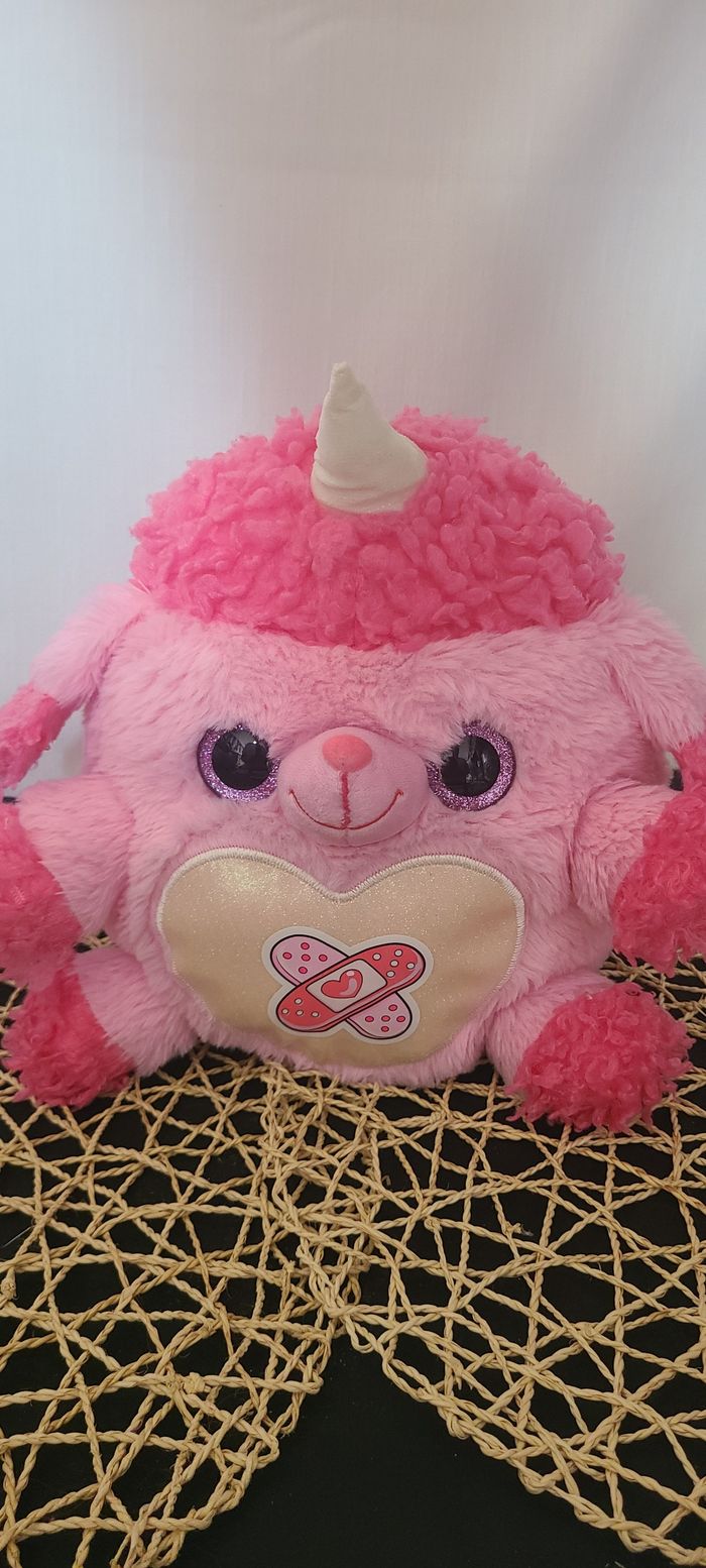 Peluche licorne aux yeux scintillants Zuru Rainbocorns