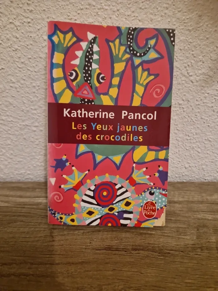 📚 livre les yeux jaunes des crocodiles