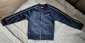 Veste zippée tape à l'oeil