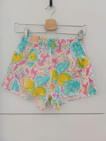 Mini-short vintage en coton.
Motifs multicolores.