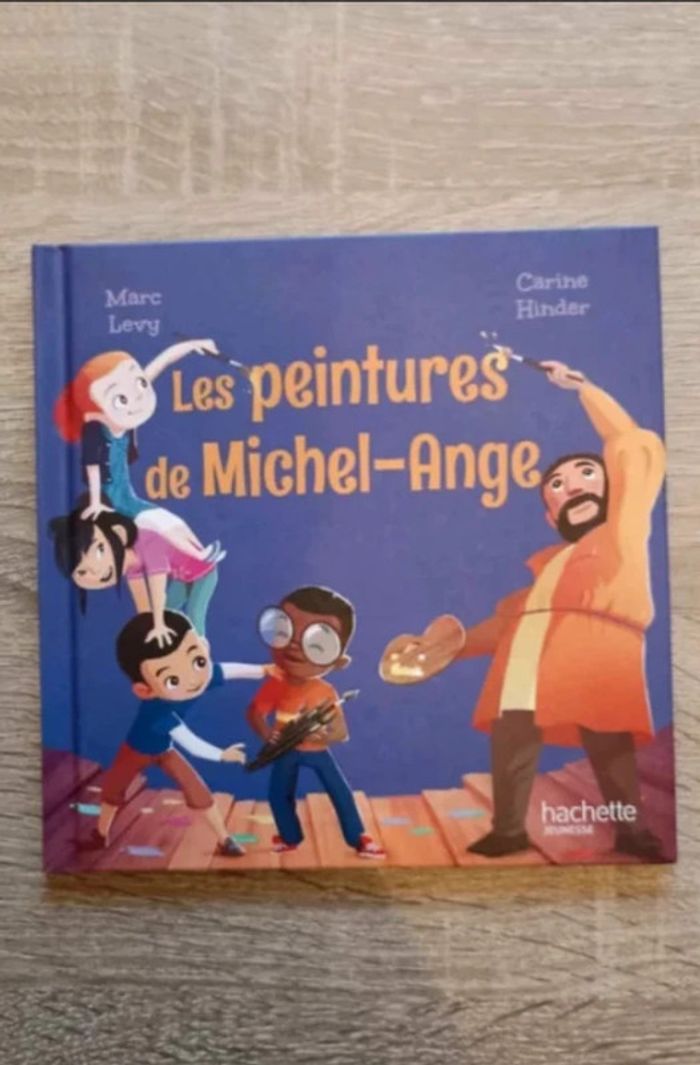 Livre Les peintures de Michel-Ange Marc Levy hachette Mac donald Très bon état